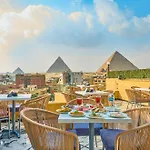 Cleopatra Tower Pyramids View